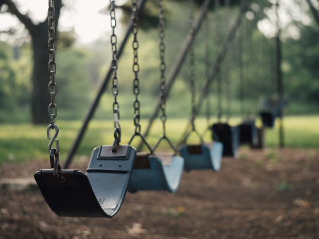 A swing set at a park presents dangers of premises liability.